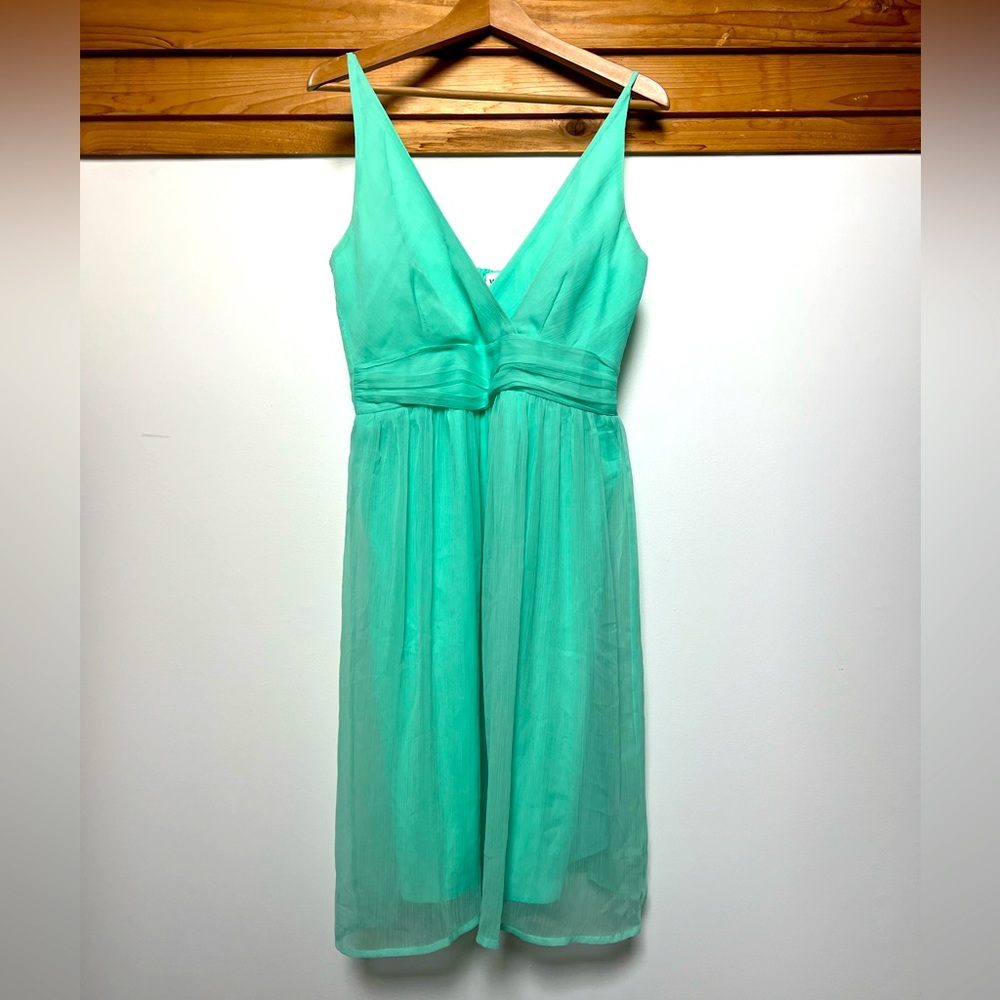 Cute mint green/blue dress. Good for summer weddings.